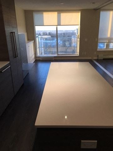 Surrey apartment for rent - a living room with a white table in the middle