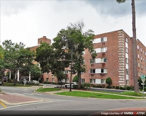 Gainesville apartment for rent - a large brick building on the corner of a street