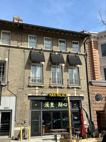 Washington apartment for rent - the front of a building with a sign that reads ham palace