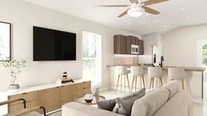 Odessa house for rent - a living room with a couch and a kitchen