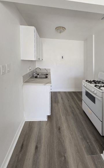 Anaheim apartment for rent - A kitchen with a stove and sink.