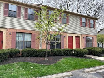 Columbus apartment for rent - the front of a house with a tree in the front yard
