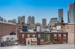 Boston apartment for rent - the view of the city from the roof of a building