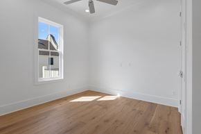 Lafayette apartment for rent - a living room with white walls and a window and wooden floors