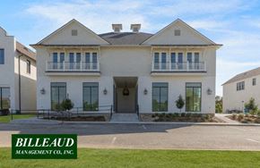 Lafayette apartment for rent - a large white house with windows and a driveway