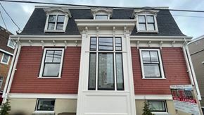 Halifax apartment for rent - a red house with white trim and a black roof