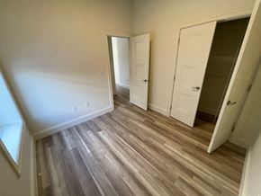 Halifax apartment for rent - a bedroom with wood flooring and a closet