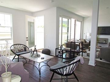Los Angeles apartment for rent - A living room with a white table and chairs.