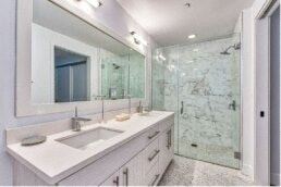 Los Angeles apartment for rent - a white bathroom with a sink and a shower