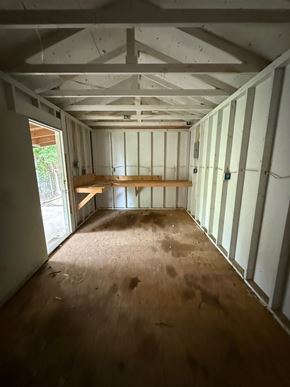 Tulsa house for rent - A room under construction with wooden floors and walls.