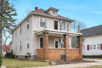 Grand Rapids apartment for rent - the front of a house with a brick facade and white siding