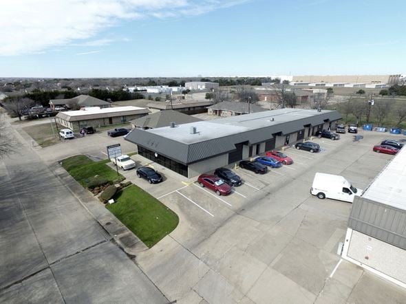 Desoto apartment for rent - an aerial view of a parking lot and a building with cars parked