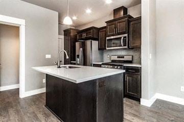 Bend apartment for rent - a kitchen with a white counter top and wooden cabinets