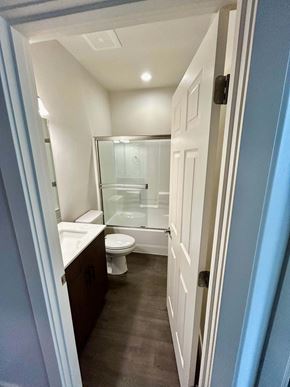 Bend apartment for rent - A bathroom with a toilet, sink and shower.