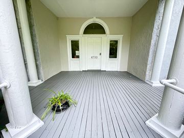 Louisville apartment for rent - the front entrance of a house with a white door and pillars