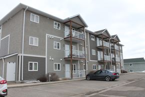 Brandon apartment for rent - a car parked in front of an apartment building
