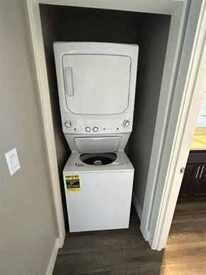Bend apartment for rent - A white toilet with a sticker on the side is in a small room.