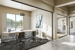 St. Louis apartment for rent - A modern office space with a large desk and chairs.