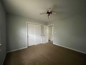 Lillington apartment for rent - a empty living room with a ceiling fan