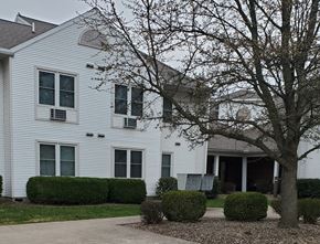 Mifflinburg apartment for rent - a white house with a tree in front of it