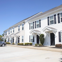Carroll apartment for rent - a large white building with a street in front of it