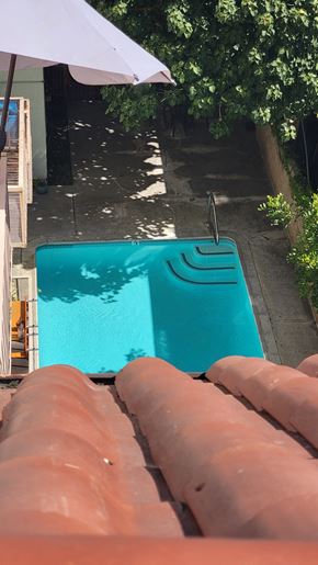 Los Angeles apartment for rent - a hot tub in the backyard of a house with an umbrella