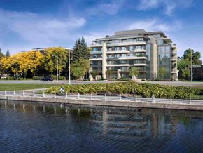 Ottawa apartment for rent - a view of a building from the water