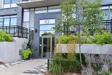 Guelph apartment for rent - the front of a building with a glass door