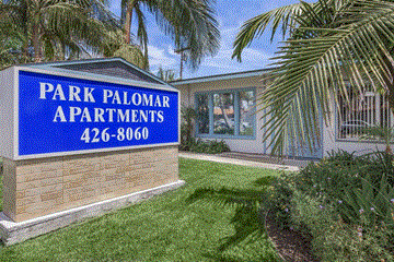 Chula Vista apartment for rent - A sign for Park Palomar Apartments with a phone number on it.