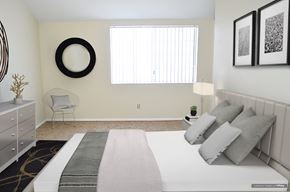 Valley Village apartment for rent - a bedroom with a white bed and pillows