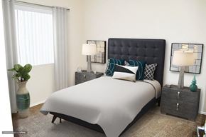 Canoga Park apartment for rent - a bedroom with a large bed and a window