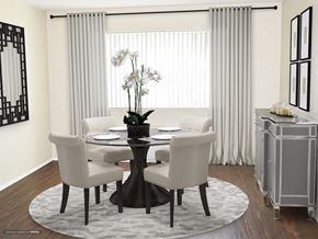 Upland apartment for rent - a dining room with a round table and white chairs