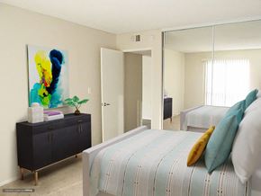 Arcadia apartment for rent - a bedroom with a bed and a mirror