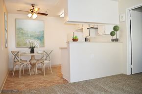 Glendora apartment for rent - an open kitchen and dining room with a table and chairs