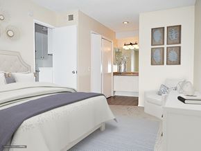 Los Angeles apartment for rent - a white and blue bedroom with a bed and a bathroom