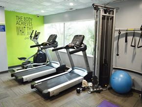 Los Angeles apartment for rent - a gym with exercise equipment and a large window