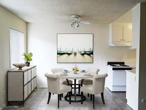 Van Nuys apartment for rent - a kitchen and dining room with a table and chairs