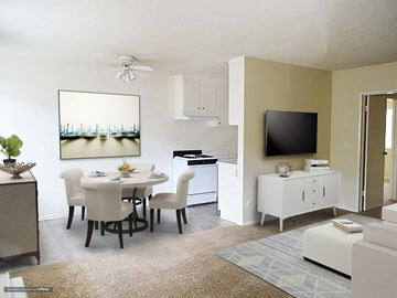 Van Nuys apartment for rent - a living room and dining room with a table and chairs