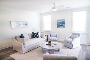 Santa Rosa Beach apartment for rent - a living room with couches and chairs and a coffee table