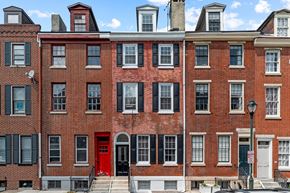 Philadelphia apartment for rent - A red brick building with a red door in the front.