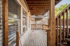 Chicago apartment for rent - the deck of a house with wooden floors and windows