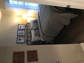 Chicago apartment for rent - a room with a bed and a mirror in it