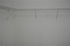 Lehigh Acres house for rent - a foggy room with a wire rack on the ceiling