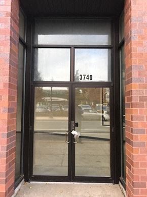 Chicago apartment for rent - A glass door with a handle and a number 3740 on it.