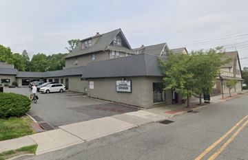 Montclair apartment for rent - A street view of a building with a sign that reads "Zimmer Site".