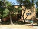 Winnipeg apartment for rent - a house with trees in front of it