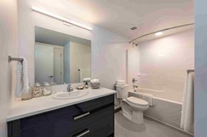 Courtenay apartment for rent - A bathroom with a sink, toilet, and bathtub.