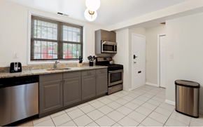 Washington apartment for rent - a kitchen with stainless steel appliances and granite counter tops