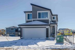 Calgary apartment for rent - a house with a garage in the snow