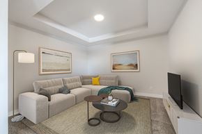 Calgary apartment for rent - a living room with a couch and a tv